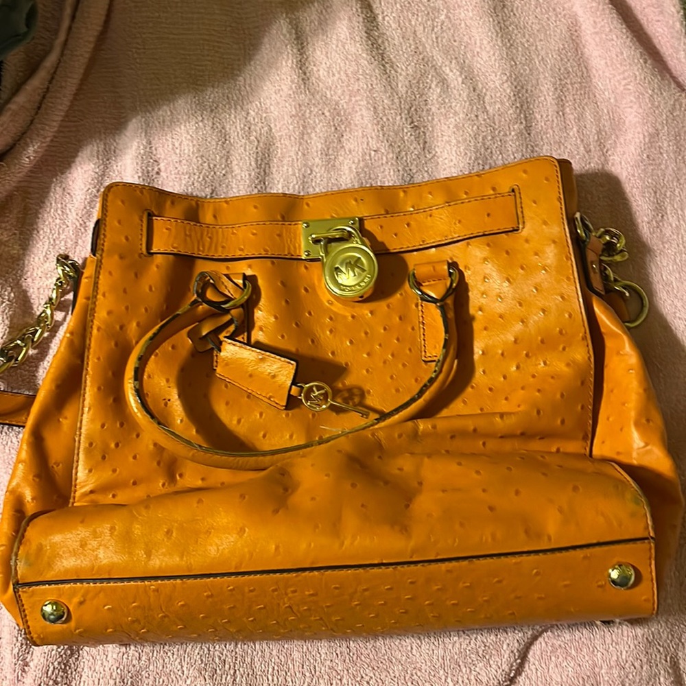 Authentic Michael Kors purse. Used condition but still had plenty of life.